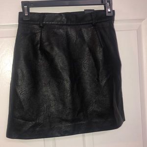 Divided faux leather mini skirt gently used size 2